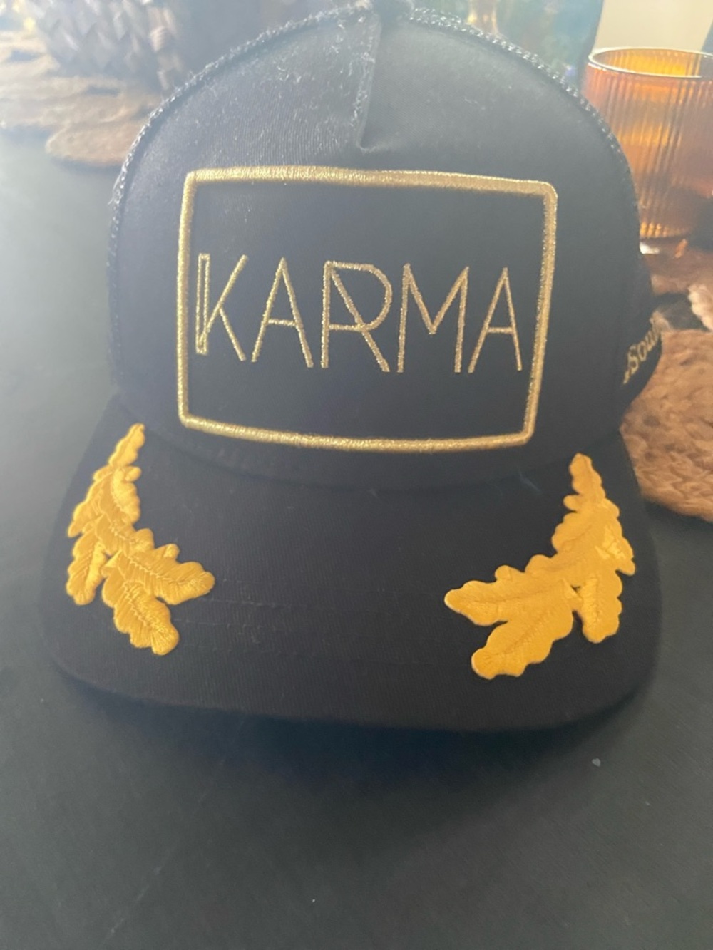 Karma Black Cap with Gold Embroidered Logo and Laurel
